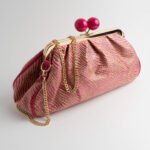 Fuchsia Gold Avra Pouch Bag